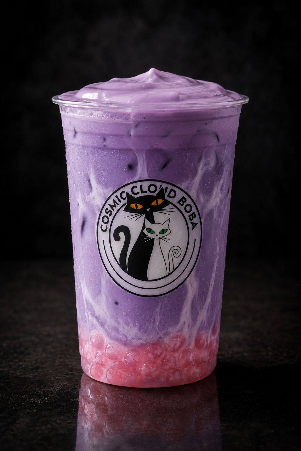 Ube milk tea with a ube milk cap